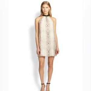 Haute Hippi Sleeveless snakeskin
Choker Mini Dress. Fully lined size small .
